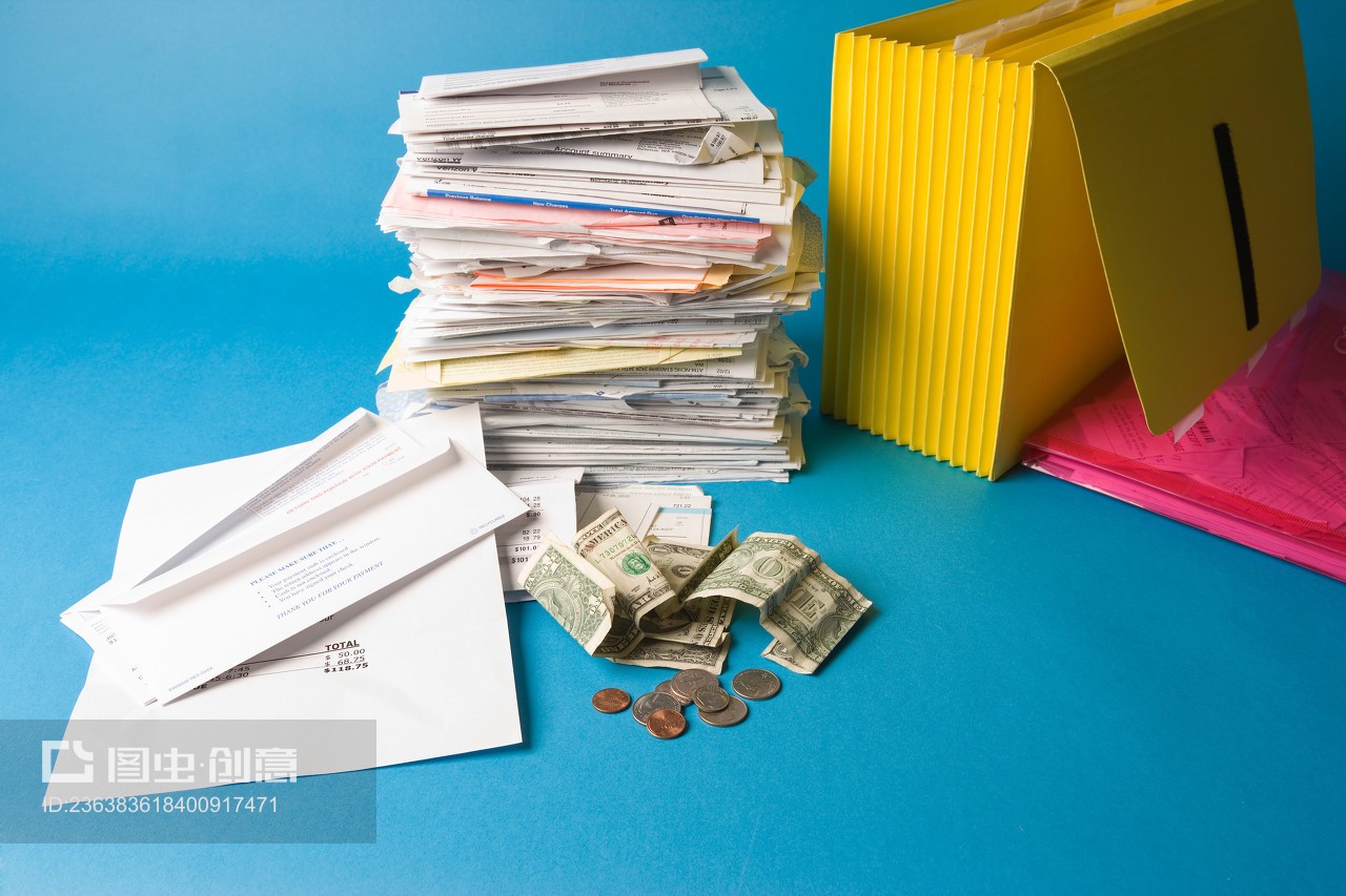 Stack of Paperwork and Money: The Balance of Modern Finance
